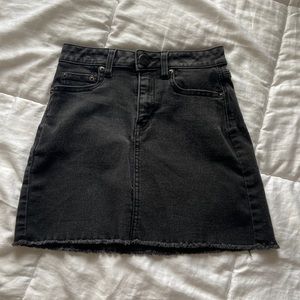 black mini “jean” skirt